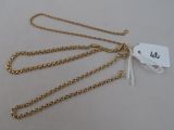 a close up of a gold chain with a tag on it