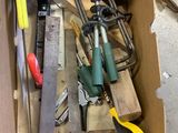 a box full of tools that are sitting on the floor