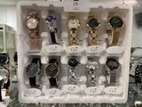a display case with many different watches on it