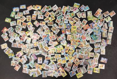 a lot of pokemon cards on the table