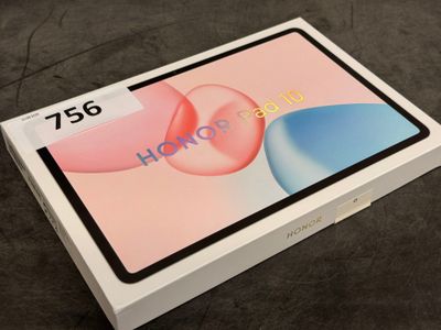 a close up of a box with a tablet on it