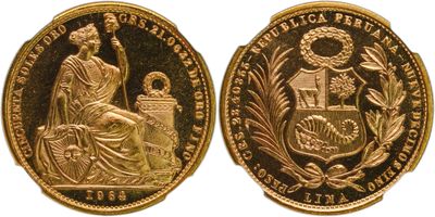 a close up of two gold coins on a white background