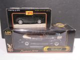 a box with a toy car in it on a table