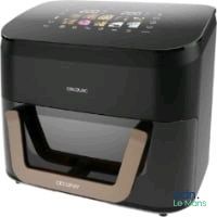 an image of a black and brown air fryer sitting on top of a counter