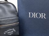 christian dior backpack in black leather with matching pouch