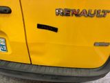 the rear end of a yellow truck with the word revault written on it