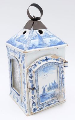 a small blue and white box with a picture on it