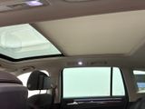 the interior of a car with the sunroof down and the sunroof down