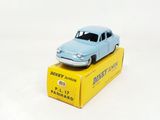 a blue toy car sitting on top of a yellow box