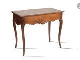 an old wooden table with a drawer on top of it