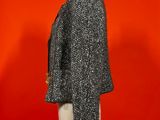 a black and white jacket on a mannequin mannequin mannequin mannequin mannequin mannequin mannequin mannequin mann