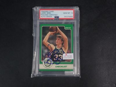 the basketball card has a signed autograph of a basketball player on it