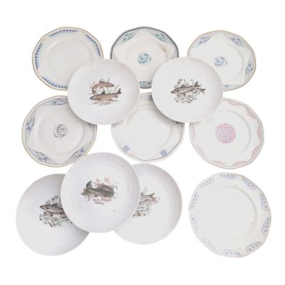 a lot of plates that have fish on them