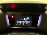 an image of a car dashboard with a digital display