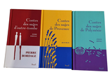 trois livres qui se trouvent l'un à côté de l'autre