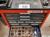a close up of a tool box filled with lots of screws