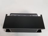 a close up of a black metal shelf on a white surface