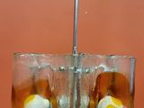 two ice cubes with an egg in them on a table
