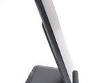 a cell phone that is sitting on a stand
