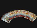 a lot of playing cards on a black background