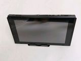 a small screen mounted on the wall of a room
