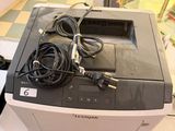 a printer that is sitting on top of a table