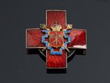 an image of a red and blue cross with a crown on it
