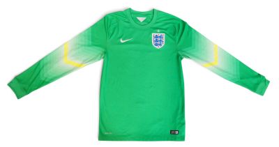 a close up of a soccer jersey with a green and yellow design