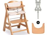 a wooden high chair with a baby seat attached to it