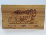 a close up of a wooden box with a picture of a building