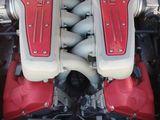 a picture of a car engine with its hood open