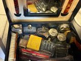 a suitcase with a lot of items inside of it