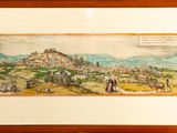 painting of a view of a town with a castle in the background