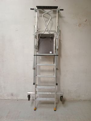 a ladder that is leaning against a wall in a room