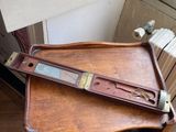 a wooden table with a clock on top of it