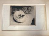 une photo en noir et blanc d'un chat dans un cadre