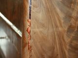 a close up of a piece of wood on a table