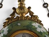 a clock that is hanging on the wall in the room