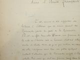 a handwritten letter written in french on a piece of paper