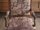 an image of a chair with a floral upholstered seat