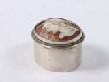 an image of a silver ring with a picture of an eagle on it