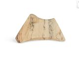 a small piece of marble sitting on a white surface