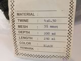 a tag that says material twine mesh on it