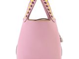 a pink handbag with yellow studded handles on a white background