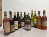 several bottles of alcohol are lined up on a table