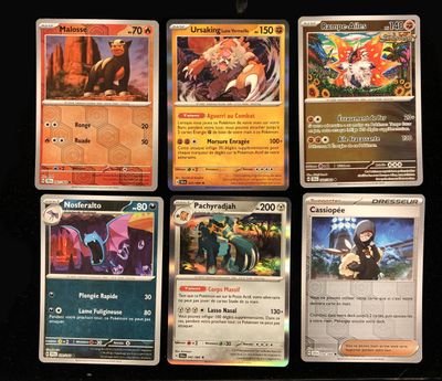 a lot of cards that are on the table