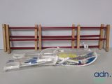 a plastic bag with toothbrushes and toothpaste in it