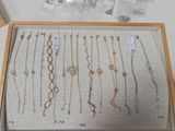 a box with many different types of bracelets in it