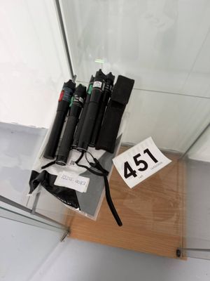 a display case with a lot of different types of flashlights