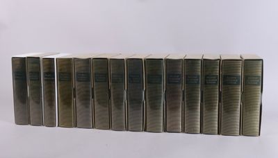 six books are stacked on top of each other on a white surface